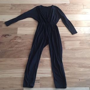 Black, long sleeved jumpsuit.